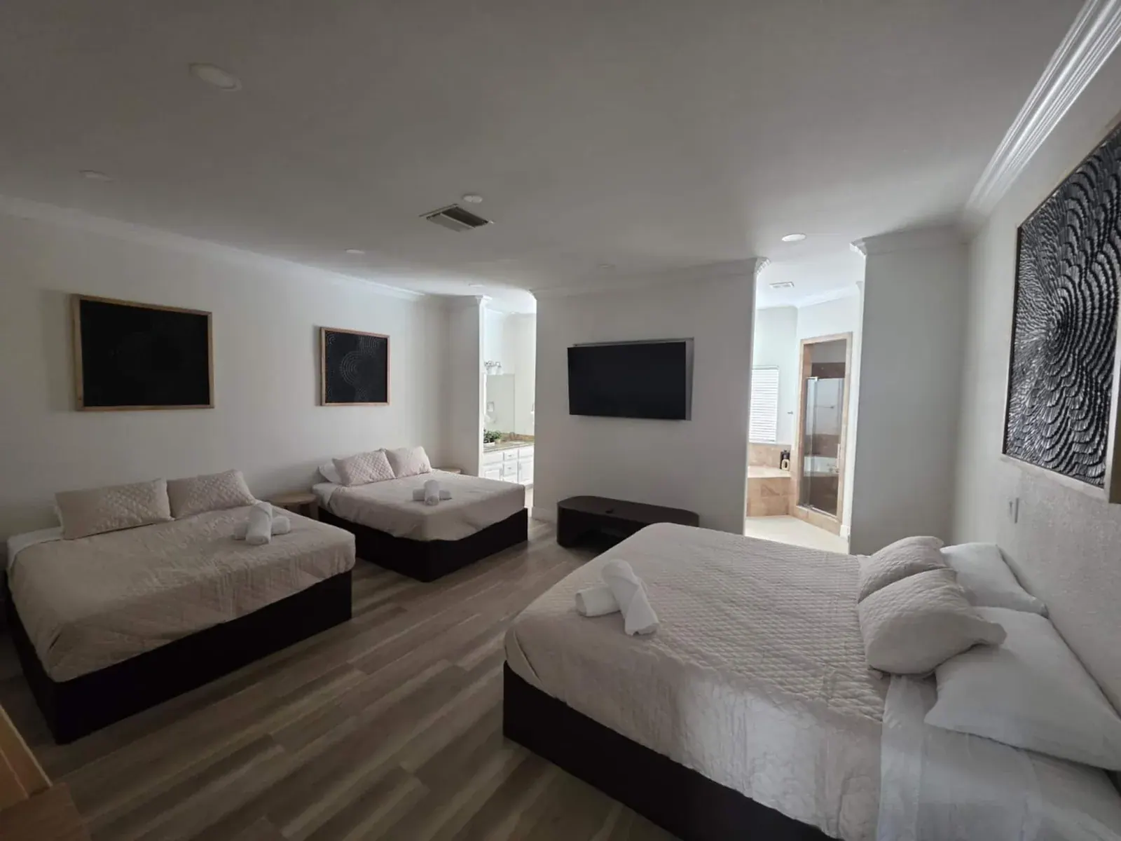 Bedroom 5 — King + two queens