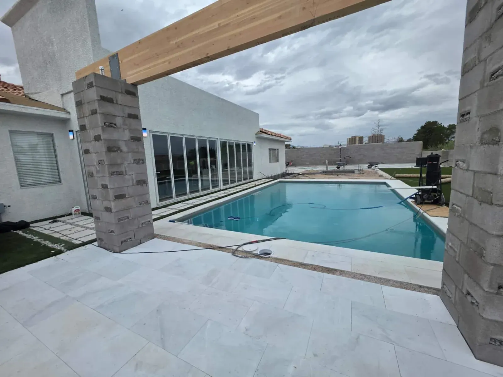 Poolside view across the villa grounds